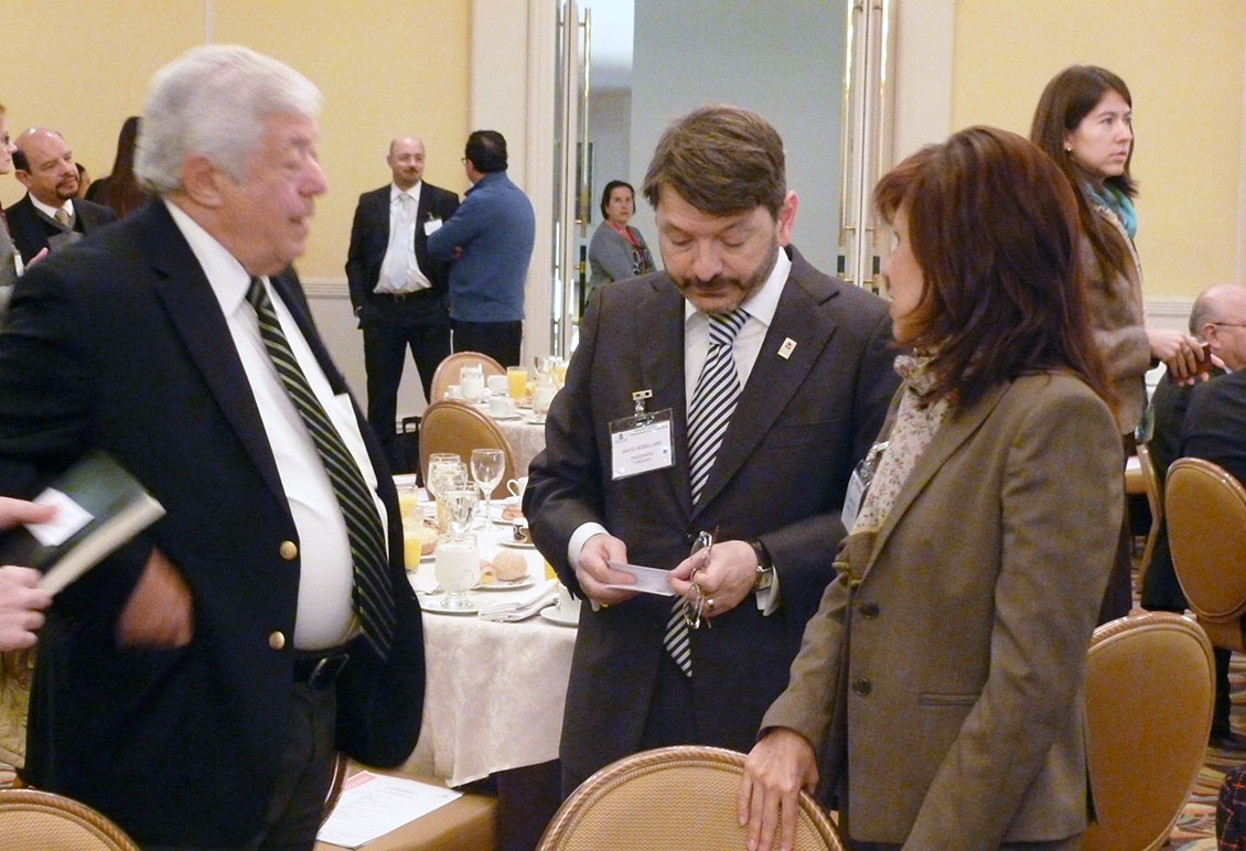 President David Robillard networking with CanCham members
