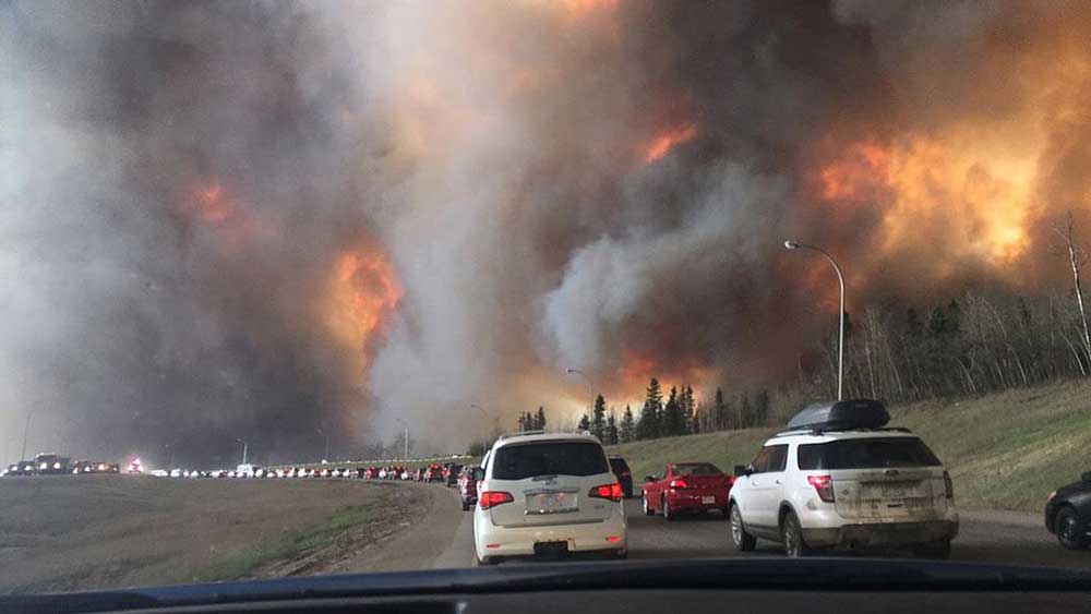 View of Fort McMurray Wildfire From Highway 63 South - oil prices