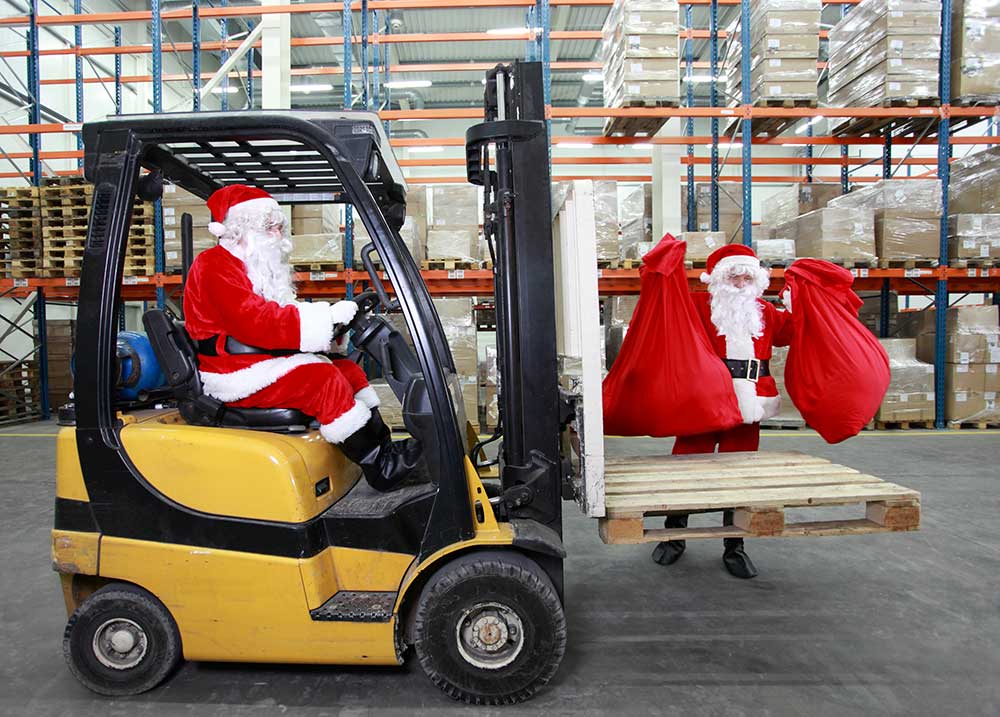 Santa Claus driving a forklift