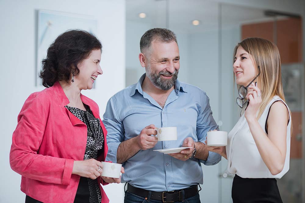 Business people chatting over coffee