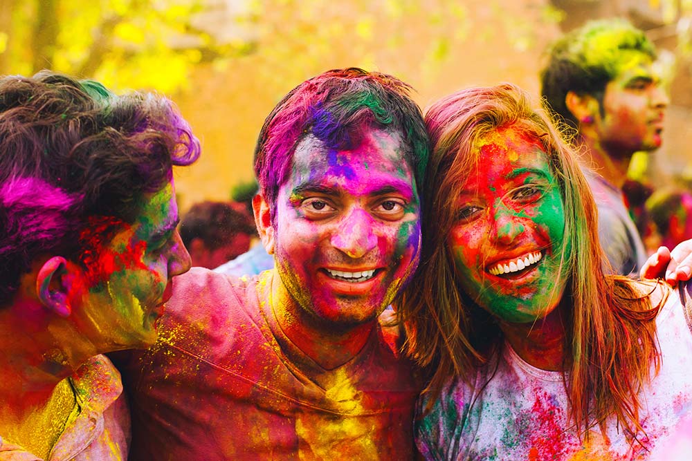 Students and tourists at festival Holi in India