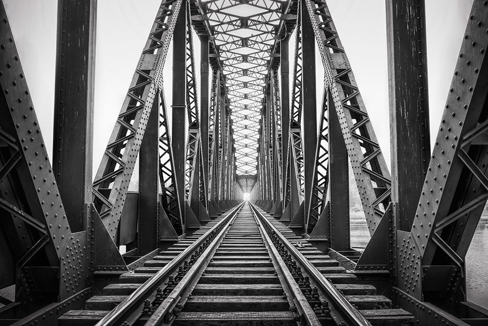 black and white train bridge