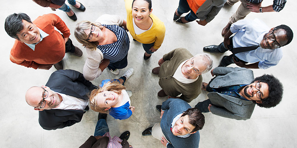 Diverse group of people looking up