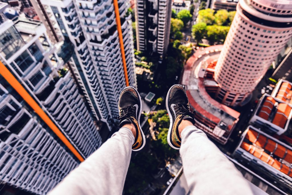 Risky seat on edge of high building