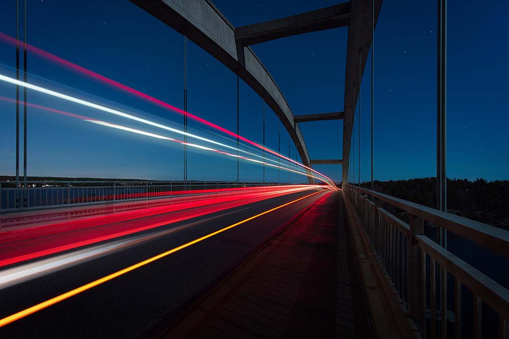 Blurred lights on highway at night - global sourcing