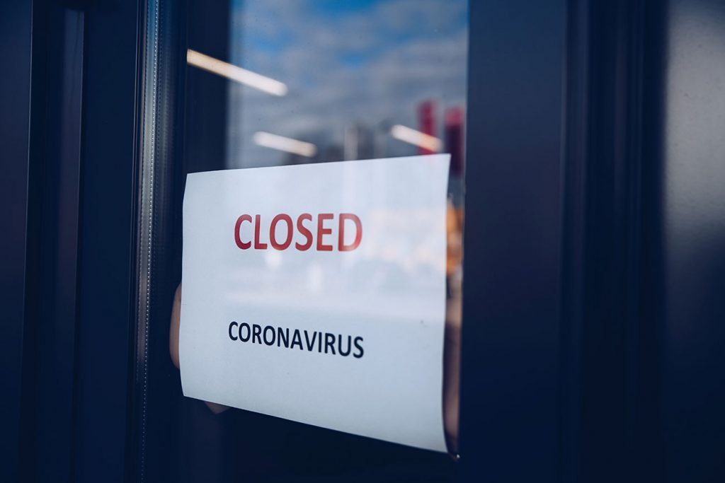 Closed Coronavirus sign on window of business