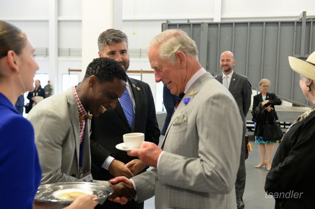 Daniel serving tea to HRH - Prince Charles