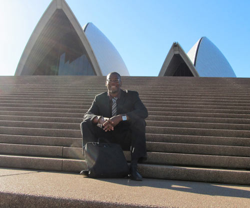 Julian Rosen outside the Sydney Opera House during his first job in Australia
