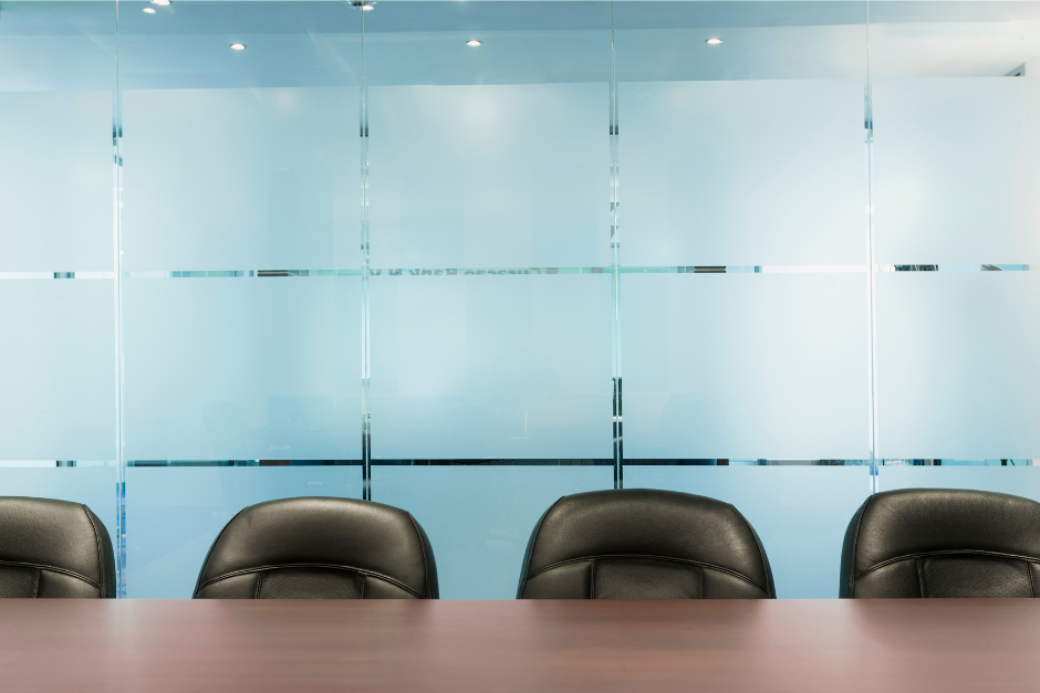 Board room with empty chairs